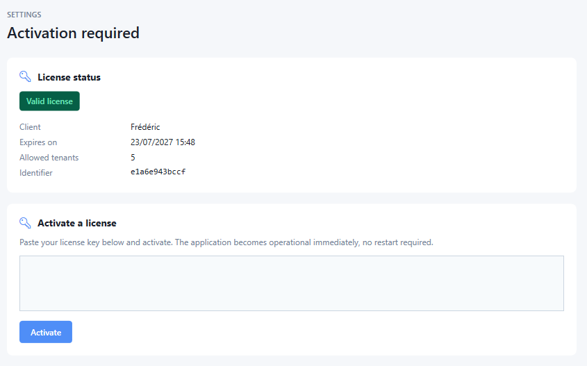 Activation screen showing licence status with client name, expiry date, allowed domains and identifier, plus a field to paste a new key